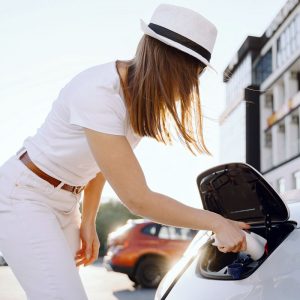 woman-charging-electro-car-electric-gas-station.jpg